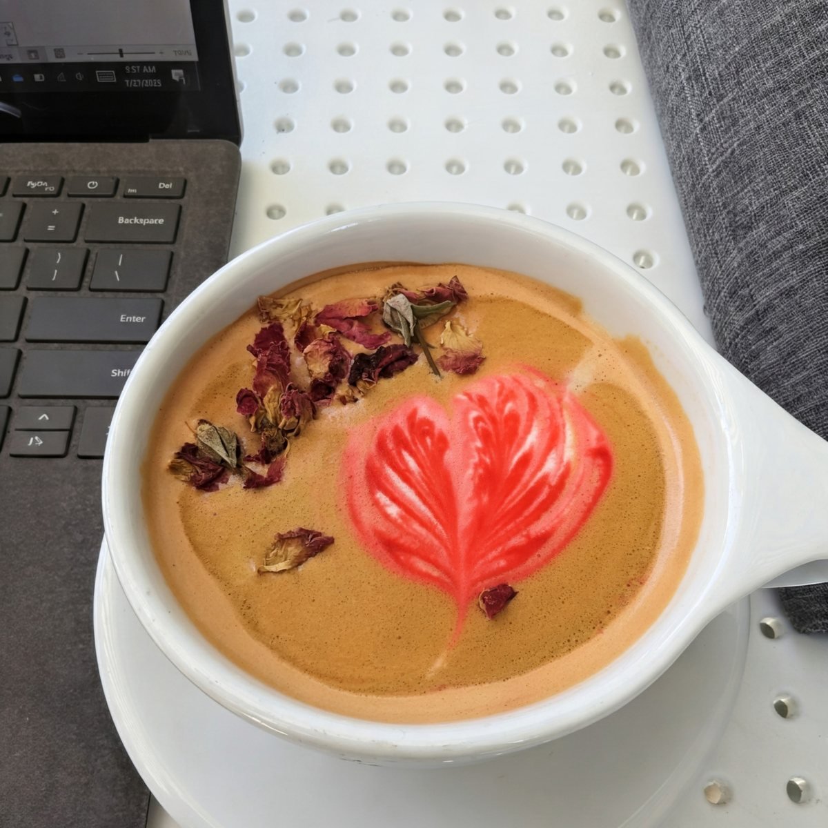 Latte with rose petal art